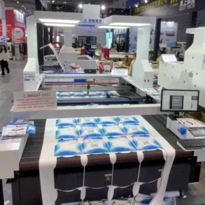 Automatic Fabric Perforation Laser Machine CO2 Textile Laser Cutter For Clothing Fabric Hole Punching Processing
