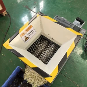 High-Efficiency Double Shaft Plastic Shredder with Pump for Solid Waste Recycling 300-500kg/h Capacity for Factories